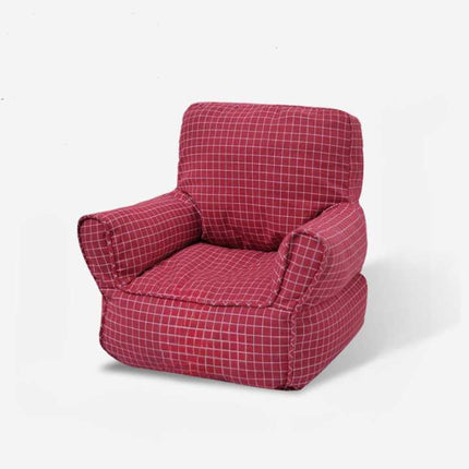 Petit fauteuil pastel pour coin cosy – Ambiance bohème naturelle