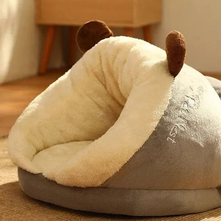 Petit nid douillet en forme de grotte avec bois de cerf pour animaux