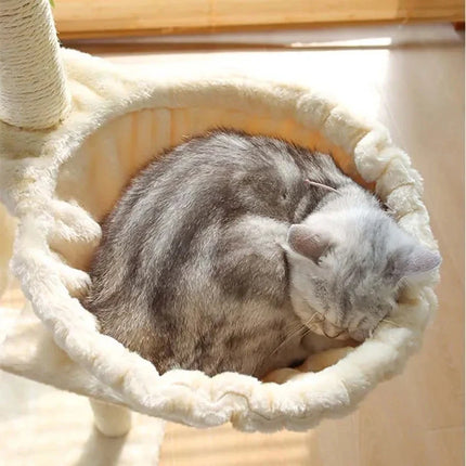 Grand arbre à chat interactif avec niche, hamac et jouets suspendus