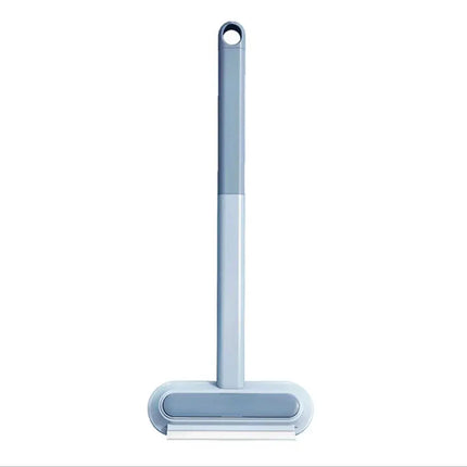 Brosse antipeluches avec manche gris et bleu – Design ajustable et pratique