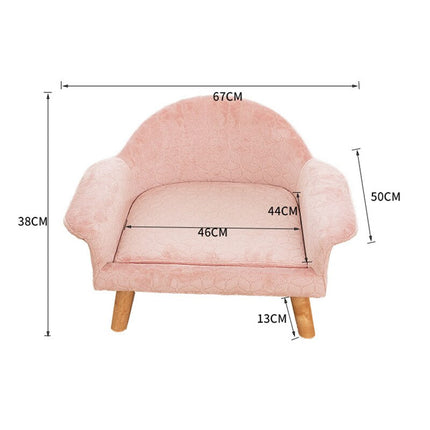 Petit fauteuil rose pour chat avec dossier arrondi et pieds en bois