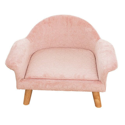 Petit fauteuil rose pour chat avec dossier arrondi et pieds en bois