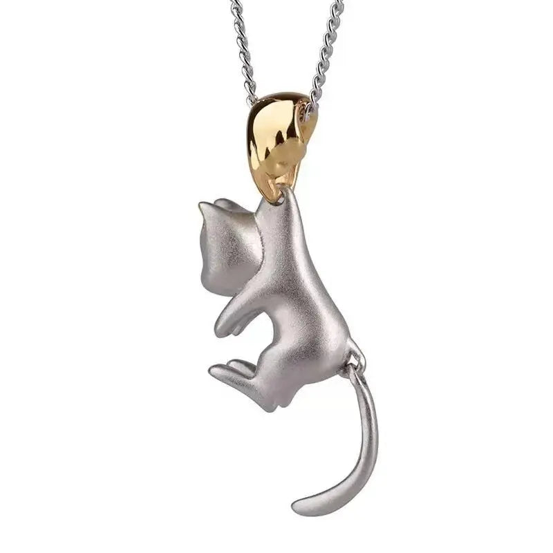 Pendentif Félin Suspendu avec Accents Dorés