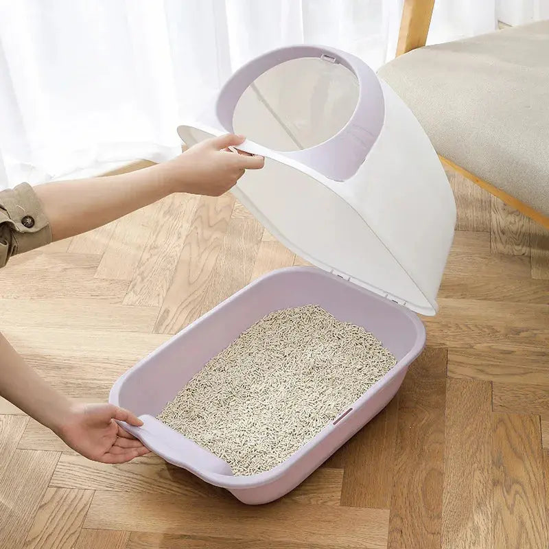 Maison de toilette arrondie pour chat avec porte battante design