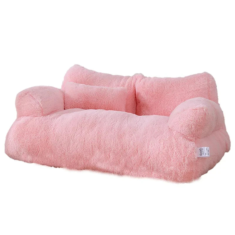 Petit canapé rose pelucheux pour moments cocooning