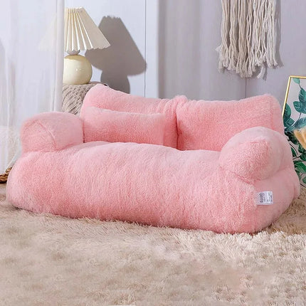 Petit canapé rose pelucheux pour moments cocooning