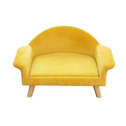 Petit fauteuil rose pour chat avec dossier arrondi et pieds en bois